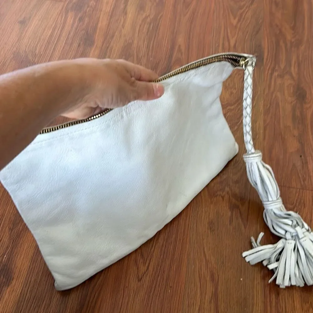 Jennifer Haley white leather clutch handbag with large tassel